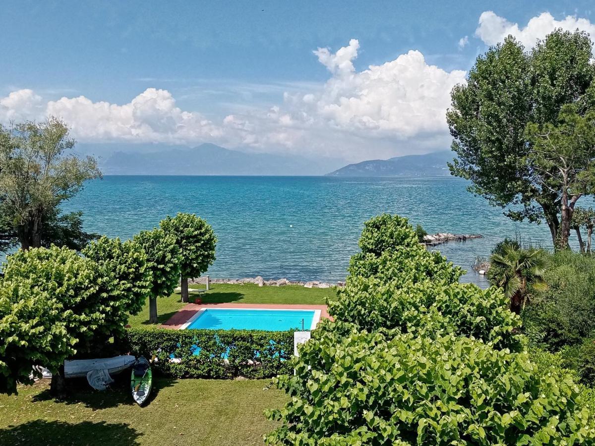 Casa Lugana 9 - Monolocale Con Piscina Fronte Lago Sirmione Bagian luar foto