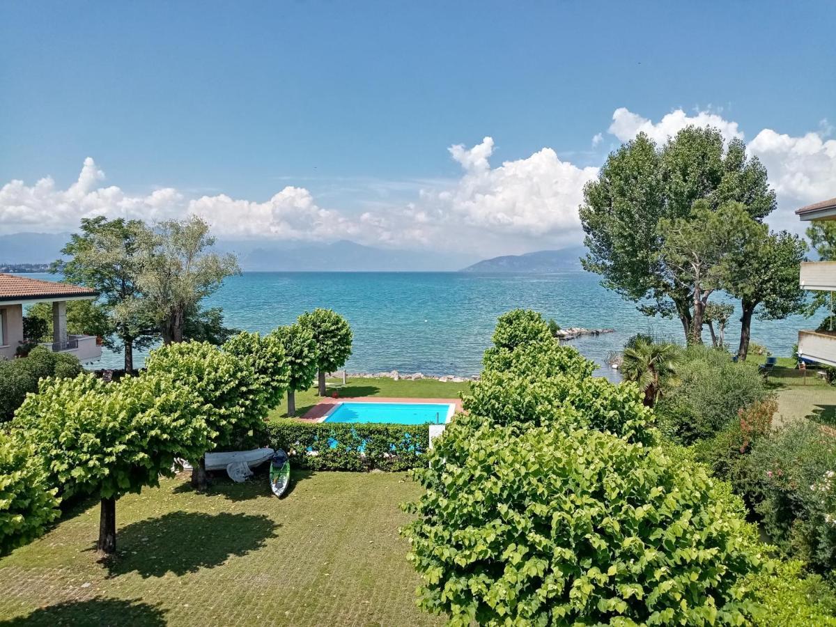 Casa Lugana 9 - Monolocale Con Piscina Fronte Lago Sirmione Bagian luar foto